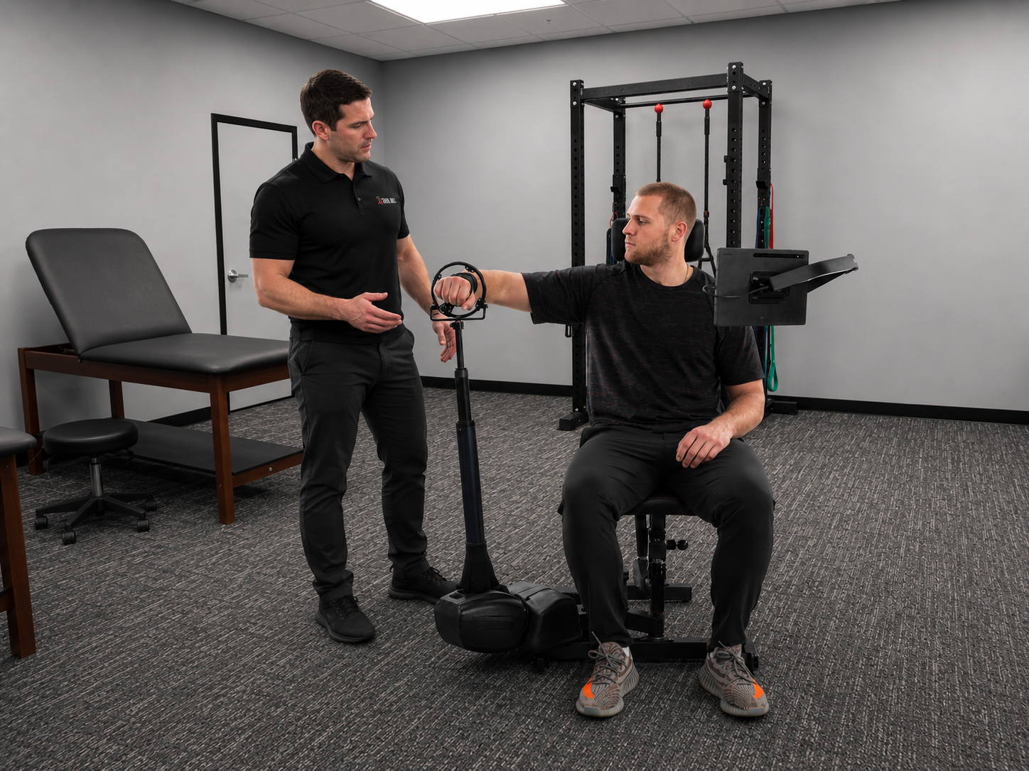 TKM Labs physical therapist working with a patient on the Humero Tech C1